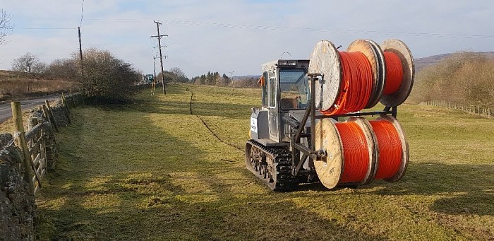 Crawler vibrating mole plough